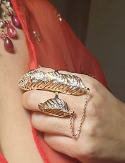 Gold with Rhinestone details double ring with chain attachment